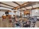 Lounge featuring hardwood floors, exposed wood beams, and a kitchen, designed for social events and community interactions at 200 4Th S Ave # 303, St Petersburg, FL 33701