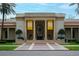 Elegant museum entrance featuring classic architecture, pillars, and a meticulously landscaped front yard at 200 4Th S Ave # 303, St Petersburg, FL 33701