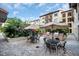 A community patio with outdoor tables and chairs plus BBQ stations, perfect for entertaining and enjoying outdoor living at 200 4Th S Ave # 303, St Petersburg, FL 33701