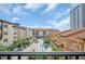 Beautiful courtyard view of a pool, lounge area, and manicured landscaping at 200 4Th S Ave # 303, St Petersburg, FL 33701