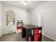 This room features wood flooring and a large table at 2513 Regal River Rd, Valrico, FL 33596