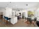 Open floor plan featuring a modern kitchen with stainless appliances and an eat-in area with an outdoor view at 2513 Regal River Rd, Valrico, FL 33596
