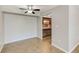 Living room showcasing tile floors with an entryway into the kitchen area at 2690 Coral Landings Blvd # 122, Palm Harbor, FL 34684