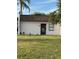 Charming single-story home featuring a well-maintained lawn and a welcoming front door at 2961 Flint N Dr, Clearwater, FL 33759