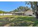 Large backyard featuring a screened-in pool area, offering privacy and a tranquil outdoor setting at 3041 Avalon Terrace Dr, Valrico, FL 33596