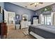 Serene primary bedroom features soft colors, neutral decor, and views of the pool at 3041 Avalon Terrace Dr, Valrico, FL 33596