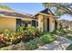 Charming front entrance with beautiful landscaping and elegant accents at 3041 Avalon Terrace Dr, Valrico, FL 33596