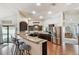 Kitchen with stainless steel appliances, granite countertops, dark cabinets and breakfast bar at 3041 Avalon Terrace Dr, Valrico, FL 33596