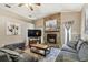 Comfortable living room with stone fireplace and open floor plan at 3041 Avalon Terrace Dr, Valrico, FL 33596