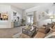Comfortable living area with sliding glass doors, stylish decor, and neutral colors at 3041 Avalon Terrace Dr, Valrico, FL 33596