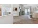 Bright and airy living room with neutral tones and access to the outdoor patio at 3041 Avalon Terrace Dr, Valrico, FL 33596