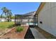 The screened-in pool offers a private retreat, complemented by mature landscaping and seamless indoor-outdoor living at 3041 Avalon Terrace Dr, Valrico, FL 33596