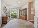 Bright sitting room with a large window offering views of the outdoors at 3041 Avalon Terrace Dr, Valrico, FL 33596