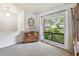 Charming sitting room with lots of natural light from the oversized window at 3041 Avalon Terrace Dr, Valrico, FL 33596