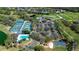 Aerial view of community amenities, including a pool, tennis courts, and recreational areas at 3119 Bent Creek Dr, Valrico, FL 33596