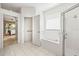 Clean, bright bathroom with separate tub and shower at 3119 Bent Creek Dr, Valrico, FL 33596
