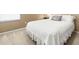 Cozy bedroom with plush carpeting features a comfortable bed perfect for a restful night's sleep at 3119 Bent Creek Dr, Valrico, FL 33596