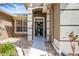 Home entrance with an open front door, beautiful landscaping and a welcoming walkway at 3119 Bent Creek Dr, Valrico, FL 33596