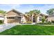 Charming single-story home with a well-manicured lawn, a two-car garage, and lovely landscaping at 3119 Bent Creek Dr, Valrico, FL 33596
