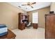 Bright office space features neutral tones and a built-in desk, ideal for work and study at 3119 Bent Creek Dr, Valrico, FL 33596