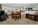 Bright dining room with a classic piano and ample natural light at 3133 Pineview Dr, Holiday, FL 34691