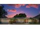 Charming single-story home with well-maintained landscaping and an attached garage, showcasing its inviting curb appeal at 3133 Pineview Dr, Holiday, FL 34691