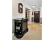 Inviting foyer featuring elegant tile flooring, classic furniture, and a warm, welcoming atmosphere at 3133 Pineview Dr, Holiday, FL 34691