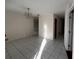 Dining room featuring tiled flooring, neutral walls, and chandelier at 3655 Dellefield St, New Port Richey, FL 34655