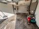 View of the spacious garage with painted walls and utility features at 3655 Dellefield St, New Port Richey, FL 34655