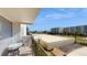 Relax on this balcony with a bistro set and enjoy the beautiful view of the surrounding community at 400 Island Way # 210, Clearwater Beach, FL 33767
