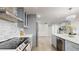 Modern kitchen featuring stainless steel appliances and light blue cabinets at 400 Island Way # 210, Clearwater Beach, FL 33767