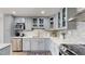 Updated kitchen featuring stainless steel appliances, and shaker style cabinets at 400 Island Way # 210, Clearwater Beach, FL 33767