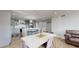 Modern kitchen and dining area with sleek countertops, stainless steel appliances, and stylish pendant lighting at 400 Island Way # 210, Clearwater Beach, FL 33767