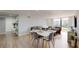 Open-concept living and dining area providing a seamless flow for modern living and entertaining at 400 Island Way # 210, Clearwater Beach, FL 33767