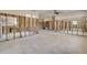 Renovated living space featuring an open concept, tile flooring, and ample natural light streaming through the windows at 401 Patica Ne Rd, St Petersburg, FL 33702