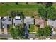 Directly above aerial view showcases the home's roof, landscaping, and surrounding neighborhood at 4148 102Nd N Pl, Clearwater, FL 33762
