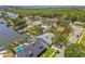 Aerial view showcasing the property's location with waterfront access and mature trees at 4226 Saltwater Blvd, Tampa, FL 33615