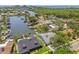 Waterfront community aerial view showcasing boat docks, mature trees, and beautiful landscaping at 4226 Saltwater Blvd, Tampa, FL 33615