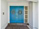 Inviting double front doors with decorative wreaths and sidelight windows at 4226 Saltwater Blvd, Tampa, FL 33615