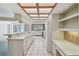 Bright kitchen with modern appliances, breakfast bar, and tiled floors at 4226 Saltwater Blvd, Tampa, FL 33615