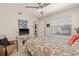 Bright bedroom with a ceiling fan and a picturesque window with natural light at 476 Santa Cruz Ne Pl # C, St Petersburg, FL 33703