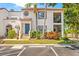 Charming two-story condo featuring lush landscaping, a private entrance, and ample parking at 476 Santa Cruz Ne Pl # C, St Petersburg, FL 33703