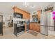 Modern kitchen includes stainless steel appliances and light wood cabinetry at 476 Santa Cruz Ne Pl # C, St Petersburg, FL 33703