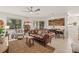Comfortable living room with ceiling fan, natural light and stylish furnishings at 476 Santa Cruz Ne Pl # C, St Petersburg, FL 33703