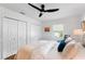 Comfortable bedroom with three closets, hardwood floors, and cozy furnishings at 500 Tallahassee Ne Dr, St Petersburg, FL 33702