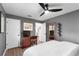 Bedroom featuring a dresser, flat screen tv, and hardwood floors at 500 Tallahassee Ne Dr, St Petersburg, FL 33702