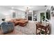 Inviting living room with a brick fireplace, comfortable seating, and stylish decor at 500 Tallahassee Ne Dr, St Petersburg, FL 33702