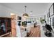 Bright living room, featuring a cozy seating area, open to office and kitchen at 500 Tallahassee Ne Dr, St Petersburg, FL 33702