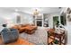 Comfortable living room with white brick fireplace, stylish furnishings, and abundant natural light at 500 Tallahassee Ne Dr, St Petersburg, FL 33702