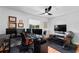 Spacious home office featuring multiple monitors, a fan, and home gym equipment at 500 Tallahassee Ne Dr, St Petersburg, FL 33702
